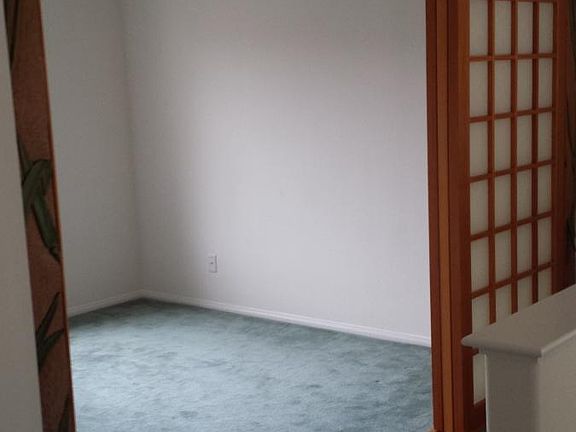 Upstairs loft bedroom/den w/ custom wood shoji screen