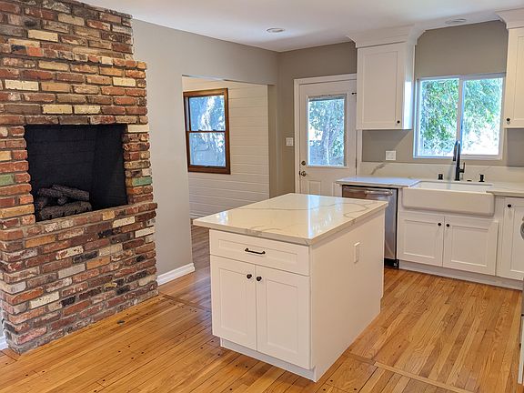 Kitchen looking at fireplace.