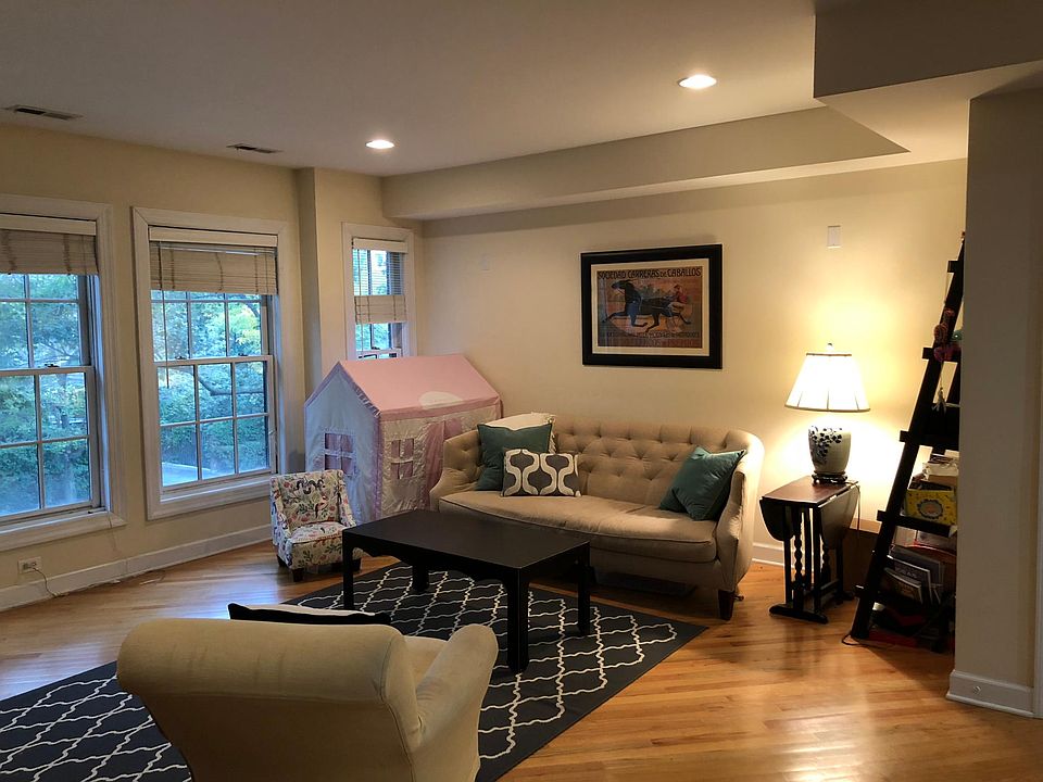 Large, open living area with large western facing windows