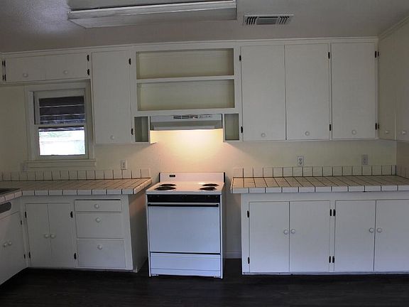 KITCHEN - STOVE CAN STAY IF NEEDED OR CAN BE MOVED OUT