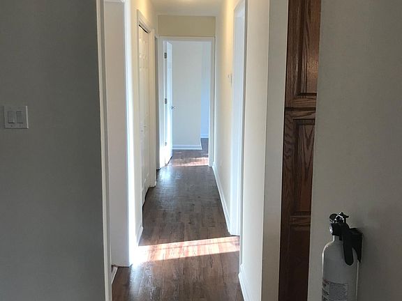 Hallway that goes to Hallway Bathroom, 3 Bedrooms & Laundry area