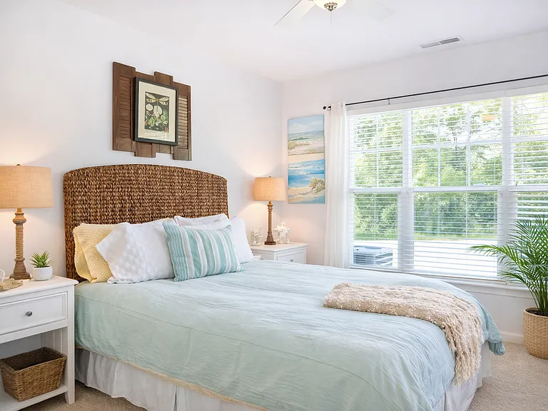 queen bed on entry level floor