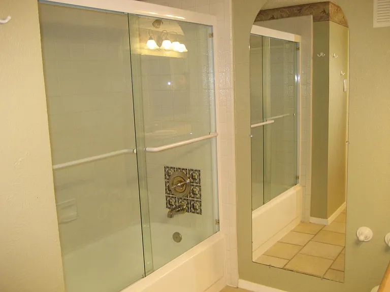 Master Bathroom Tub with glass doors