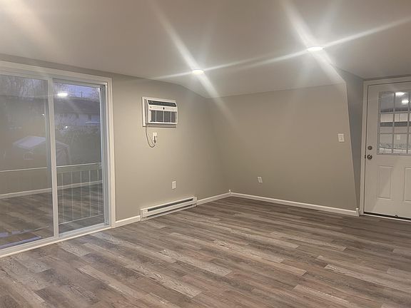 Living Room looking at front and sliding door