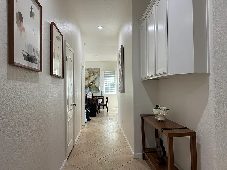Hallway separate bedrooms and living room