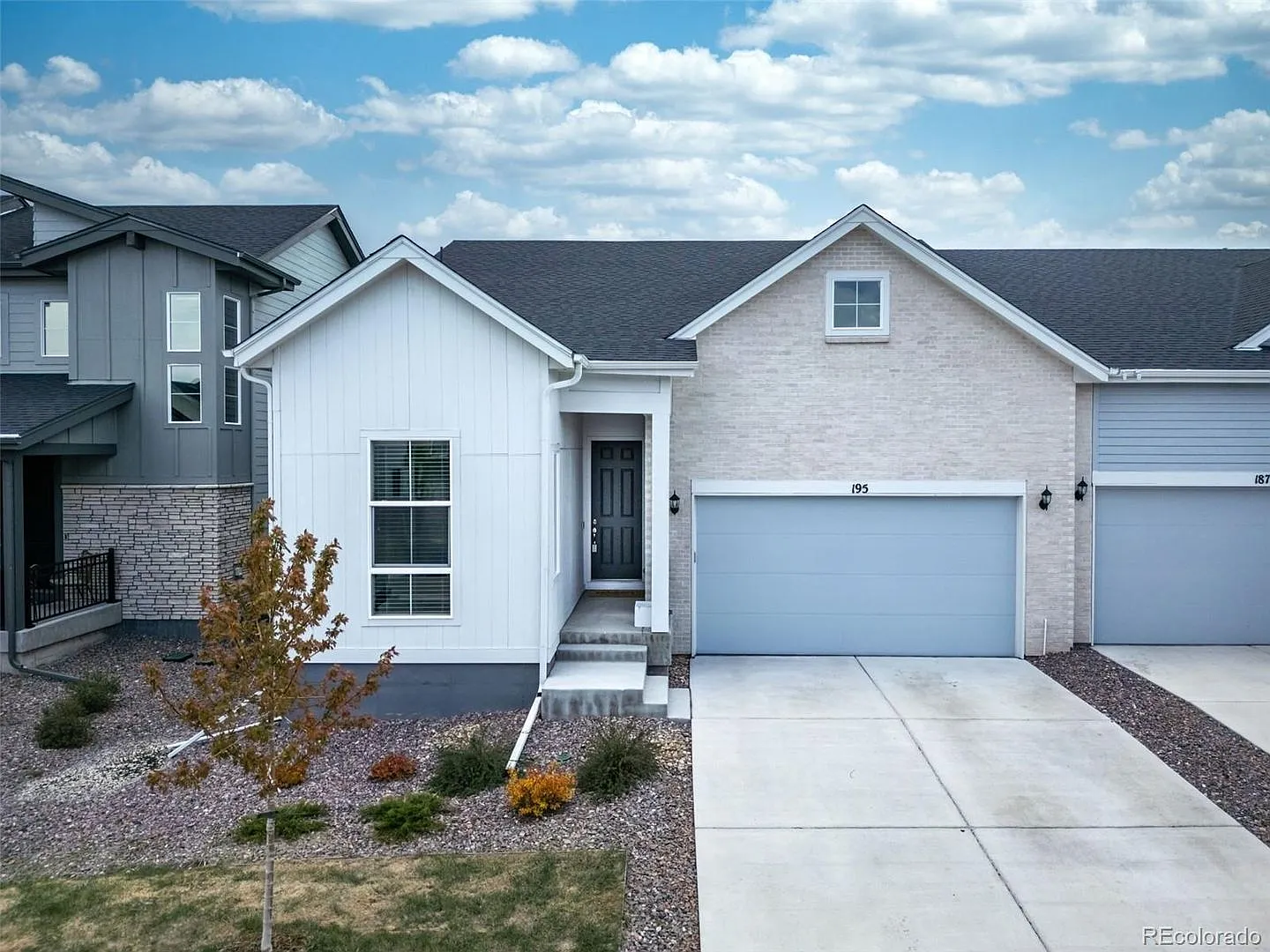 New ranch style home with a finished basement, spacious primary suite, open kitchen, & profession... — Photo 2