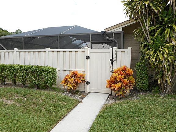 ENTRY TO SPACIOUS PATIO & TOWNHOME