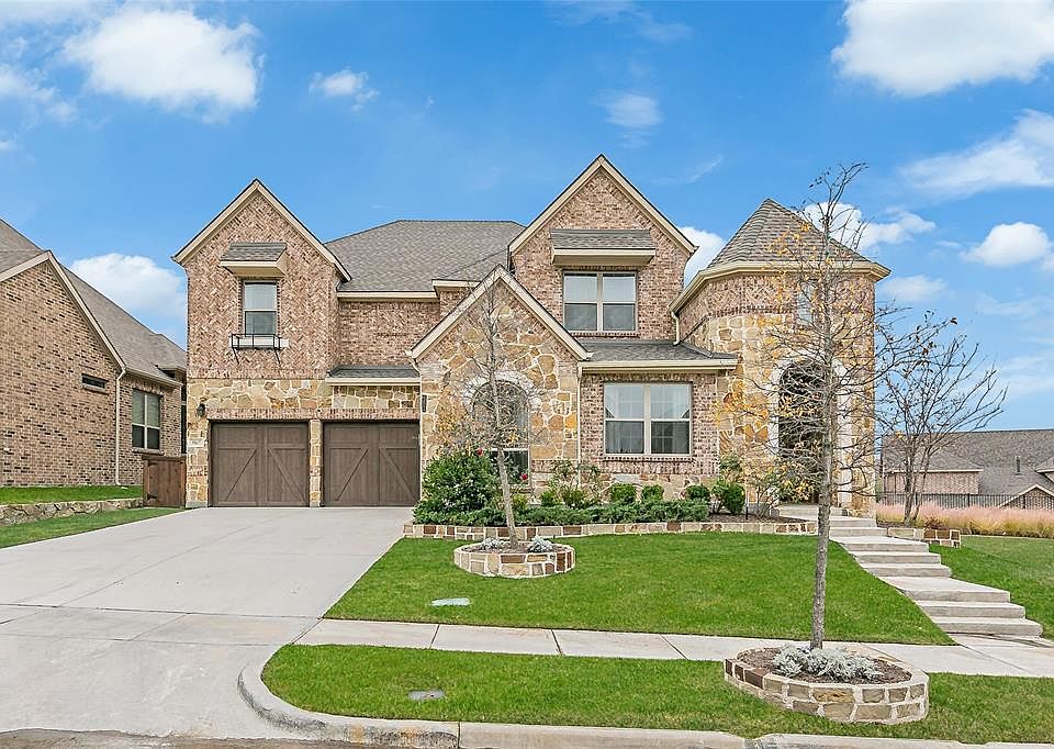 Beautiful home on a corner lot next to greenspace.