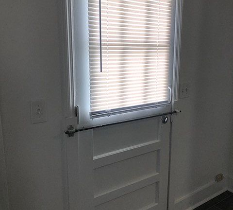 back door with small porch