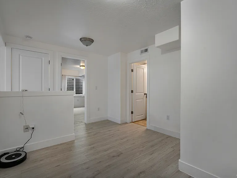 Downstairs extra space with a vanity, mirror with plugs not pictured.