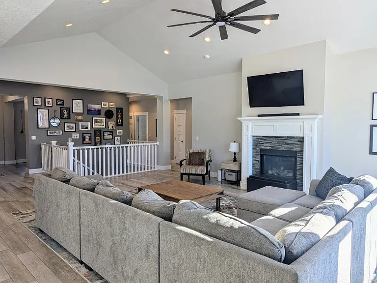Looking at the entryway and great room/staircase going to lower level walk-out basement