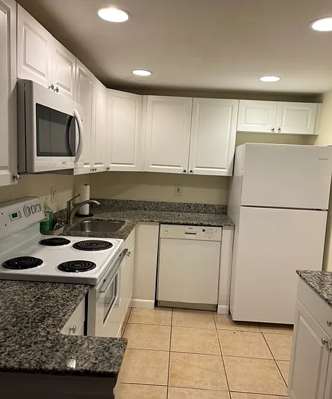 New white kitchen with granite counter