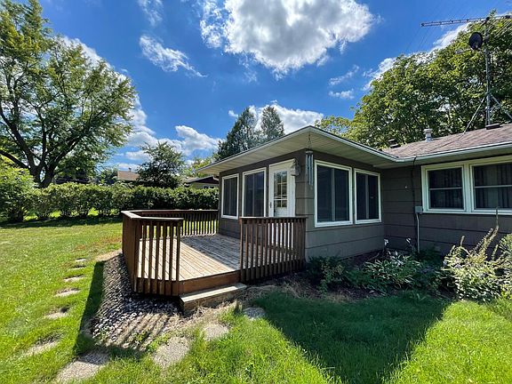 Deck extending from sunroom.