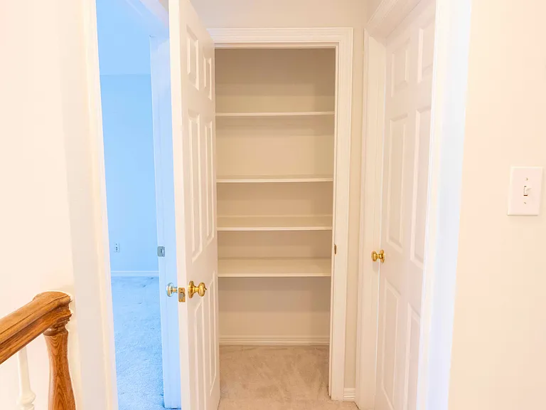 Linen closet in the hallway on the second floor