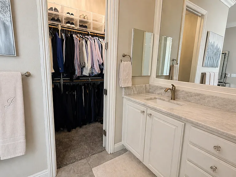 His vanity with walk in closet