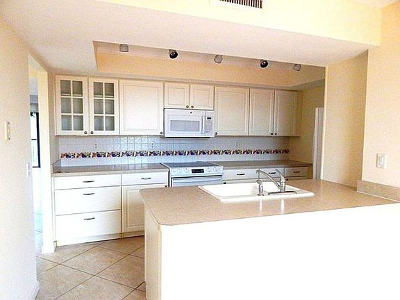 2nd image of 5250 Woodland Lakes Dr APT 231