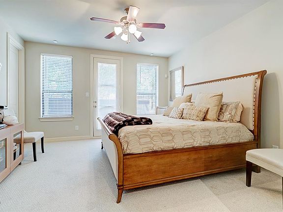 Downstairs room with full bathroom and patio access is currently used as a guest room, but can be any room you so desire.