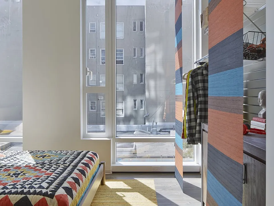 Bedroom with hard surface flooring