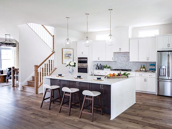 Large kitchen with ample cabinet space and large center island