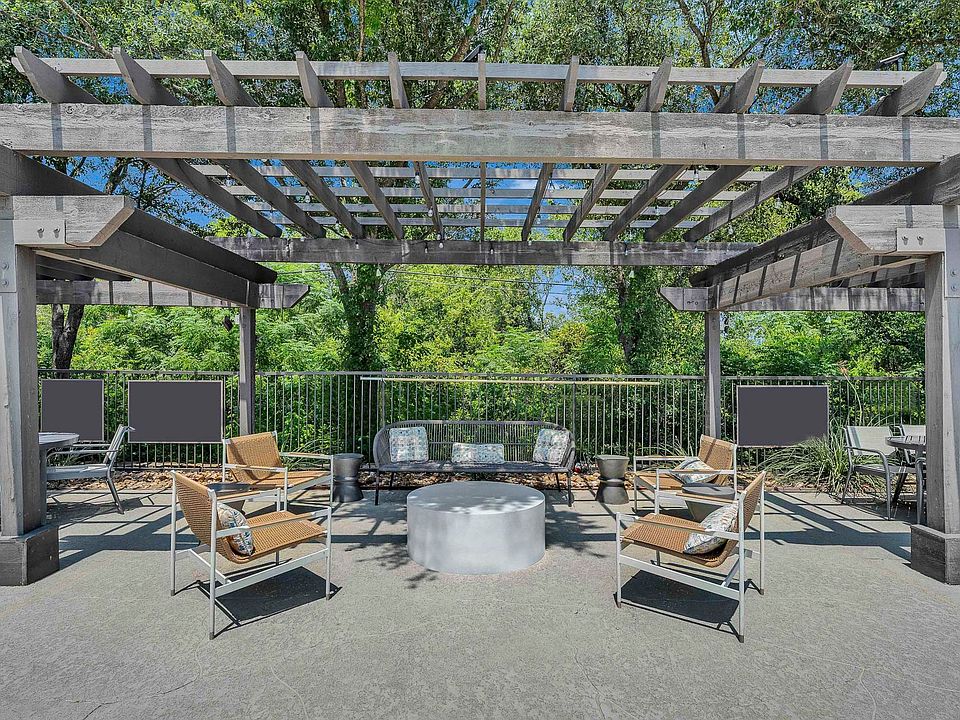 Poolside seating with BBQ grills