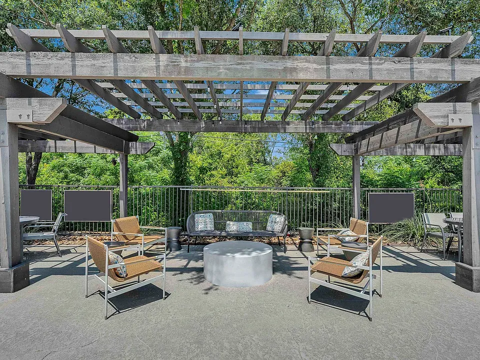 Poolside seating with BBQ grills