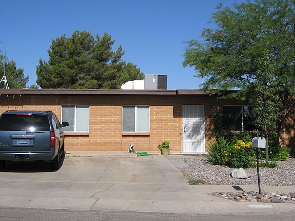 Front of house mesquite tree