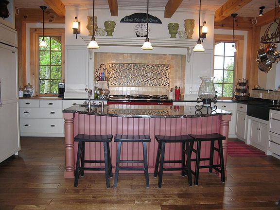 Kitchen With Aga Range and Sub-Zero Refrigerator