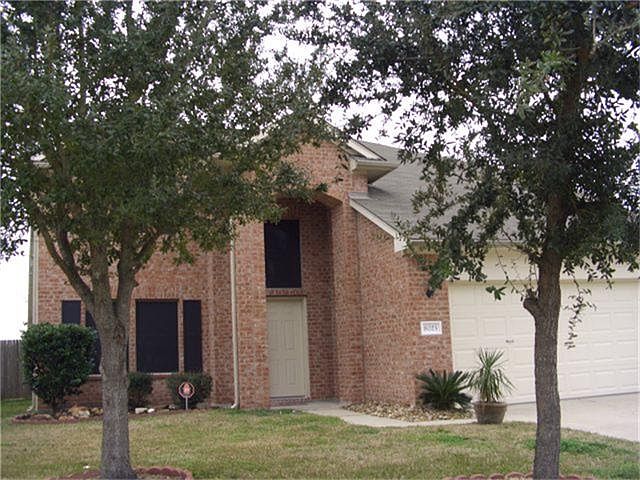 Great curb appeal with double wide driveway and two oak trees. This neighborhood has walking trails 