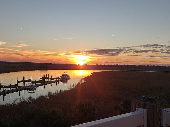 View of Darien River from condo at sunset.