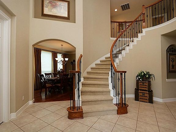 Views of the study and circular staircase