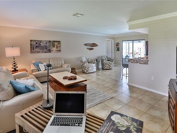 Tiled flooring and crown moulding.....