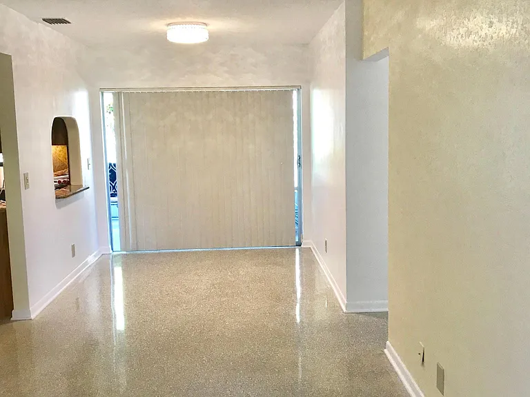 entering home. Blinds leading to back patio