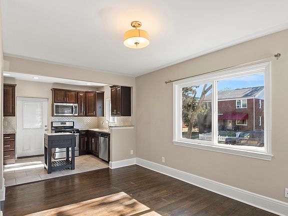 Foyer to Living Room and Kitchen