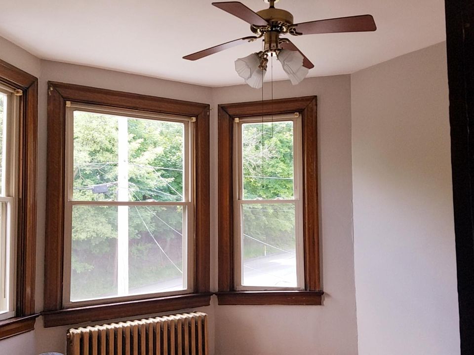 First bedroom with new neutral carpeting.