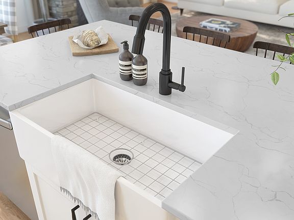 Kitchen with white farmhouse apron-front sink