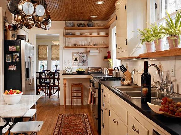 Kitchen with slate countertops and stainless appliances