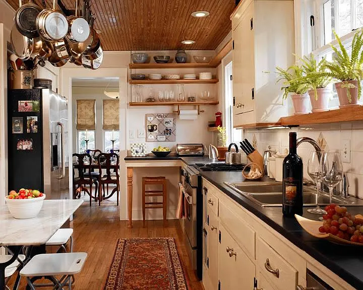 Kitchen with slate countertops and stainless appliances