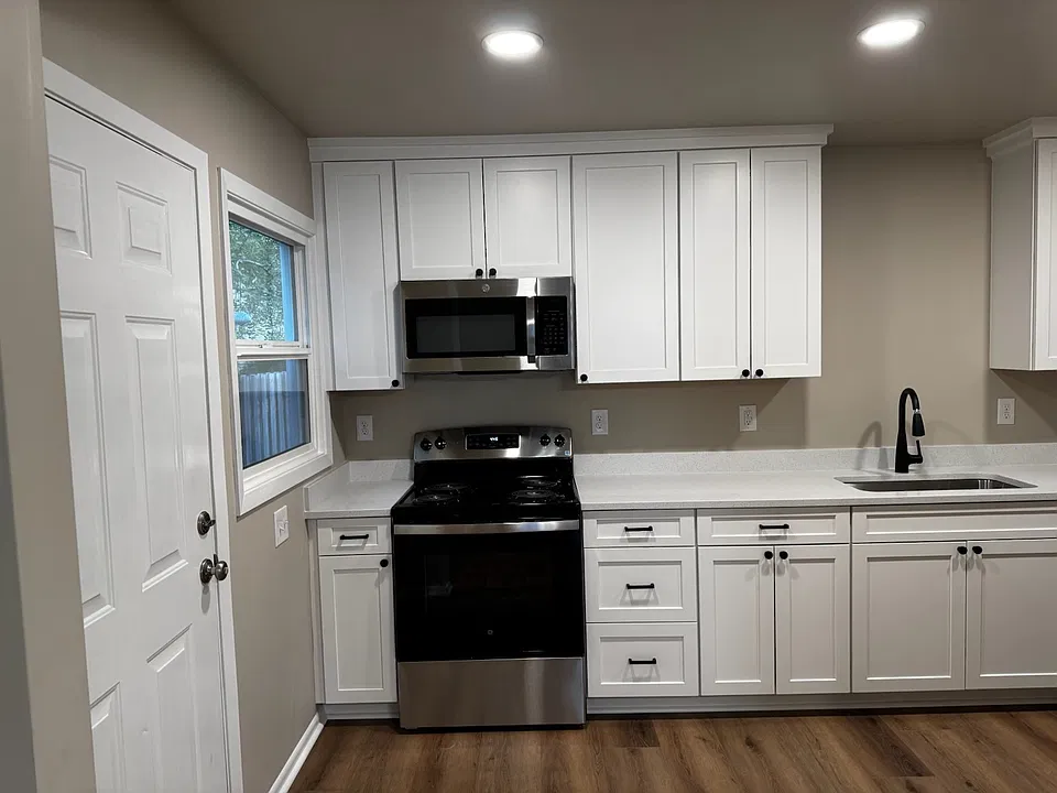 Newly remodeled kitchen with new appliances, countertops, and slow closing cabinets and drawers.