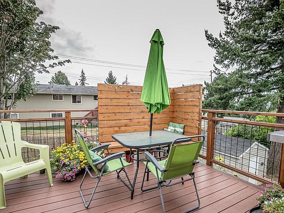 Large deck off the dining room with a peek a boo bay view