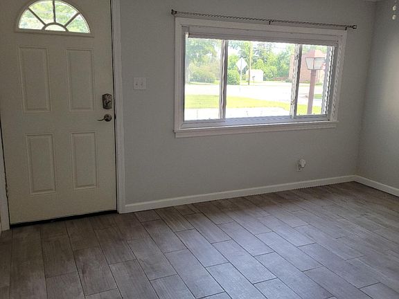 front door, living room kitchen area