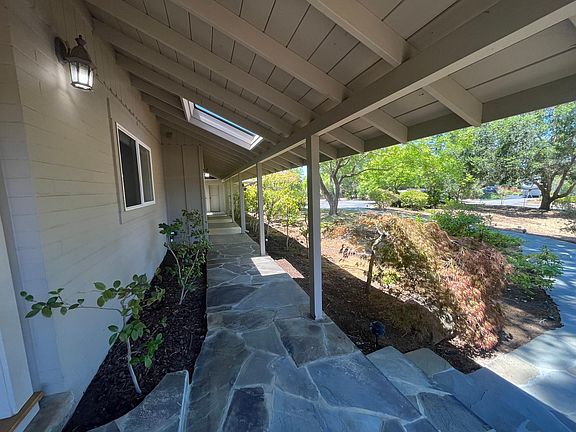The tranquil stroll through the garden path and the covered walkway