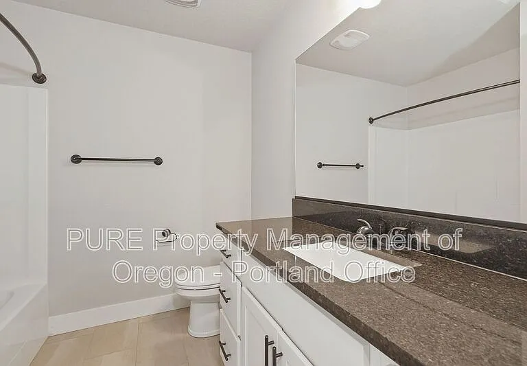 1730 NE Gilbert Ln — Photo 11