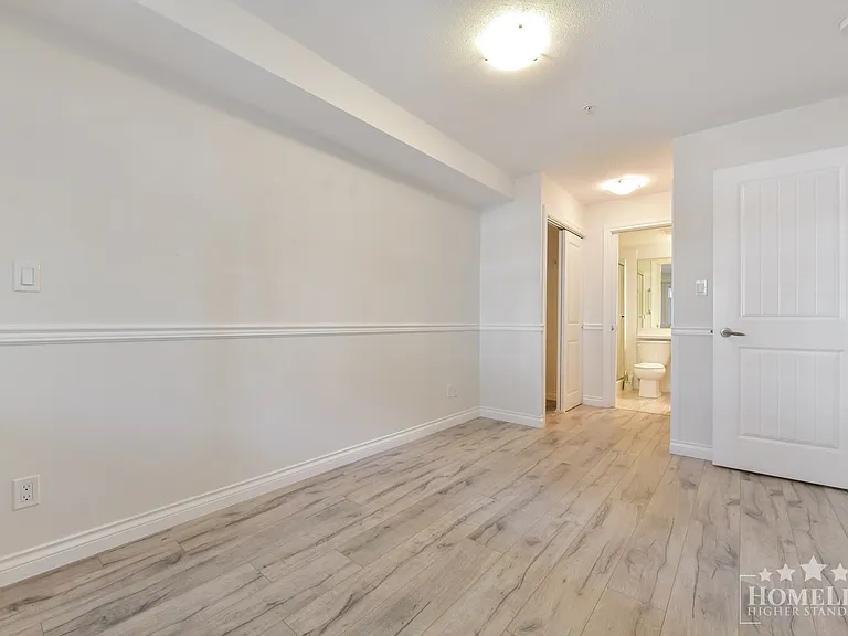 5650 201a St #218 — Photo 13