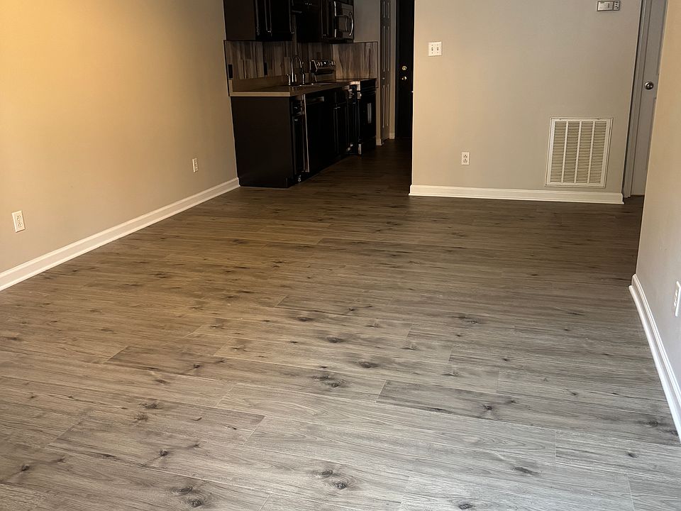 New flooring and paint throughout.