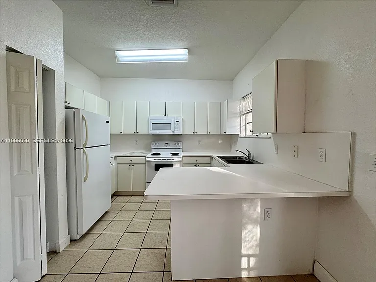 2590 NE 3rd Dr #203 — Photo 9