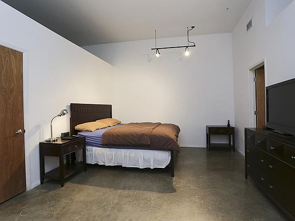 As you enter unit #110, your large master bedroom welcomes you on your left.