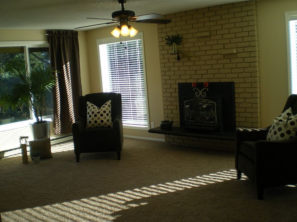 Living room w/ new carpet, paint & vinyl windows