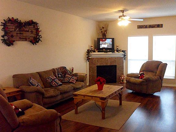 OWNER USES THE DEN /DINING ROOM COMBINATION FOR AN EXTRA LARGE LIVING SPACE