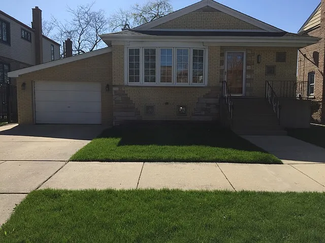 5152 S Menard Ave photo 1