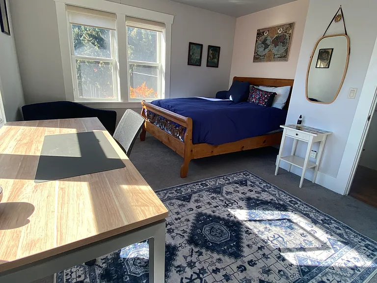 View of 2nd Queen bedroom, huge windows overlooking the park